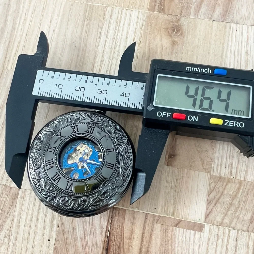 Black mechanical double sided Skelton peephole pocket watch working